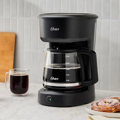 Cafetera De Filtro Reutilizable Oster Dcs121b 12 Tazas 900w Negro